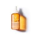 Vichy Ideal Soleil Solar Protective Water Hydrating SPF50 Λαμπερό Μαύρισμα με Νερό Προστασίας από Τον Ήλιο με Β-Καροτένιο, 200ml